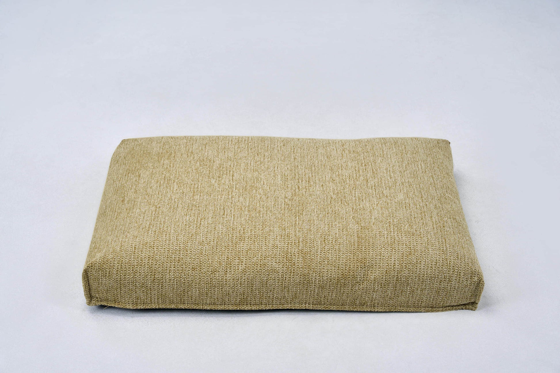 AirNest dog bed (S) in lemongrass, front view of rectangular cushion