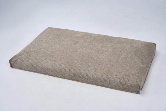 Dog bed cushion in light beige fabric with squared corners