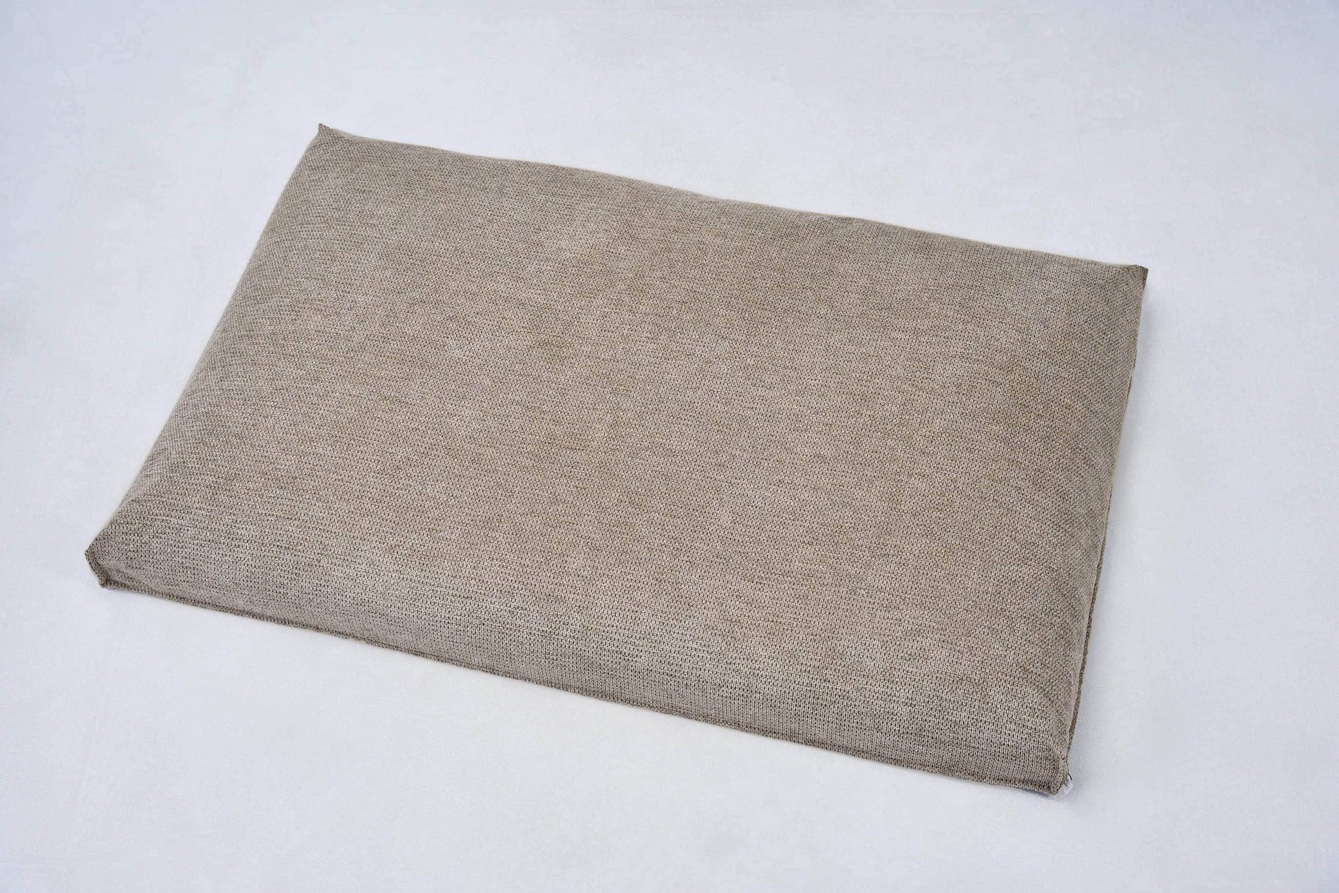 Taupe rectangular dog bed with flat cushion, low-profile design